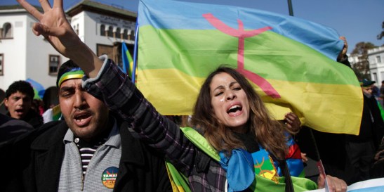 Local Amazigh people attend a rally in celebration of the Amazigh New Year, and also to express solidarity with Libyan Amazigh people, in Rabat